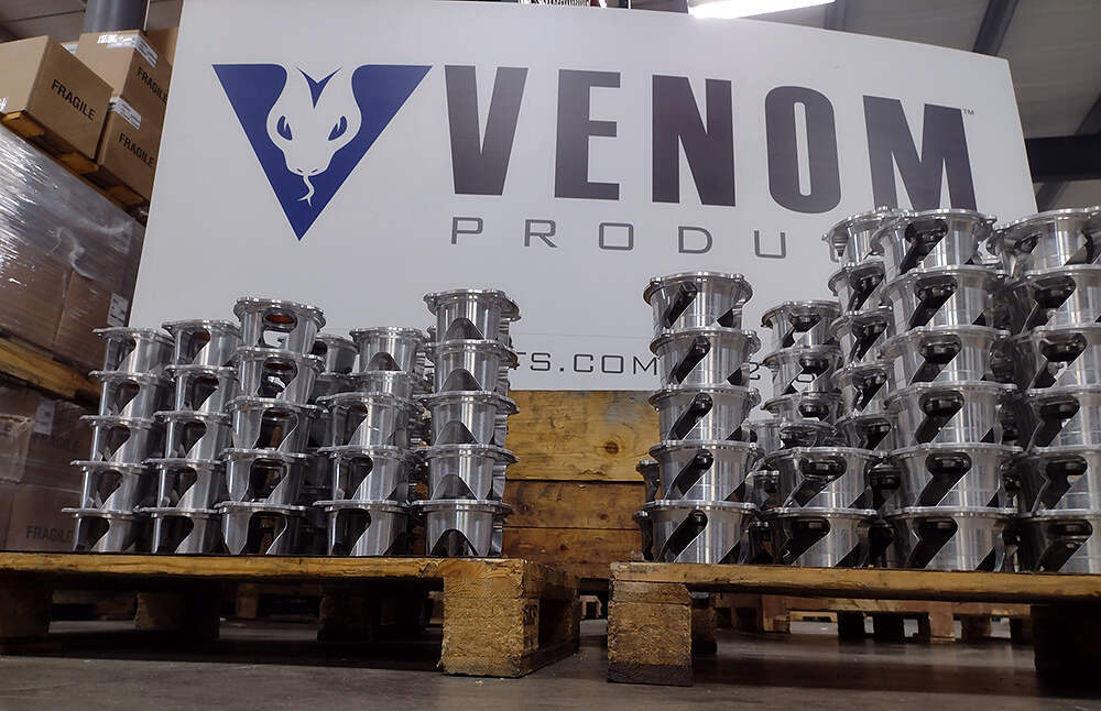 Venom Products displayed on wooden palettes